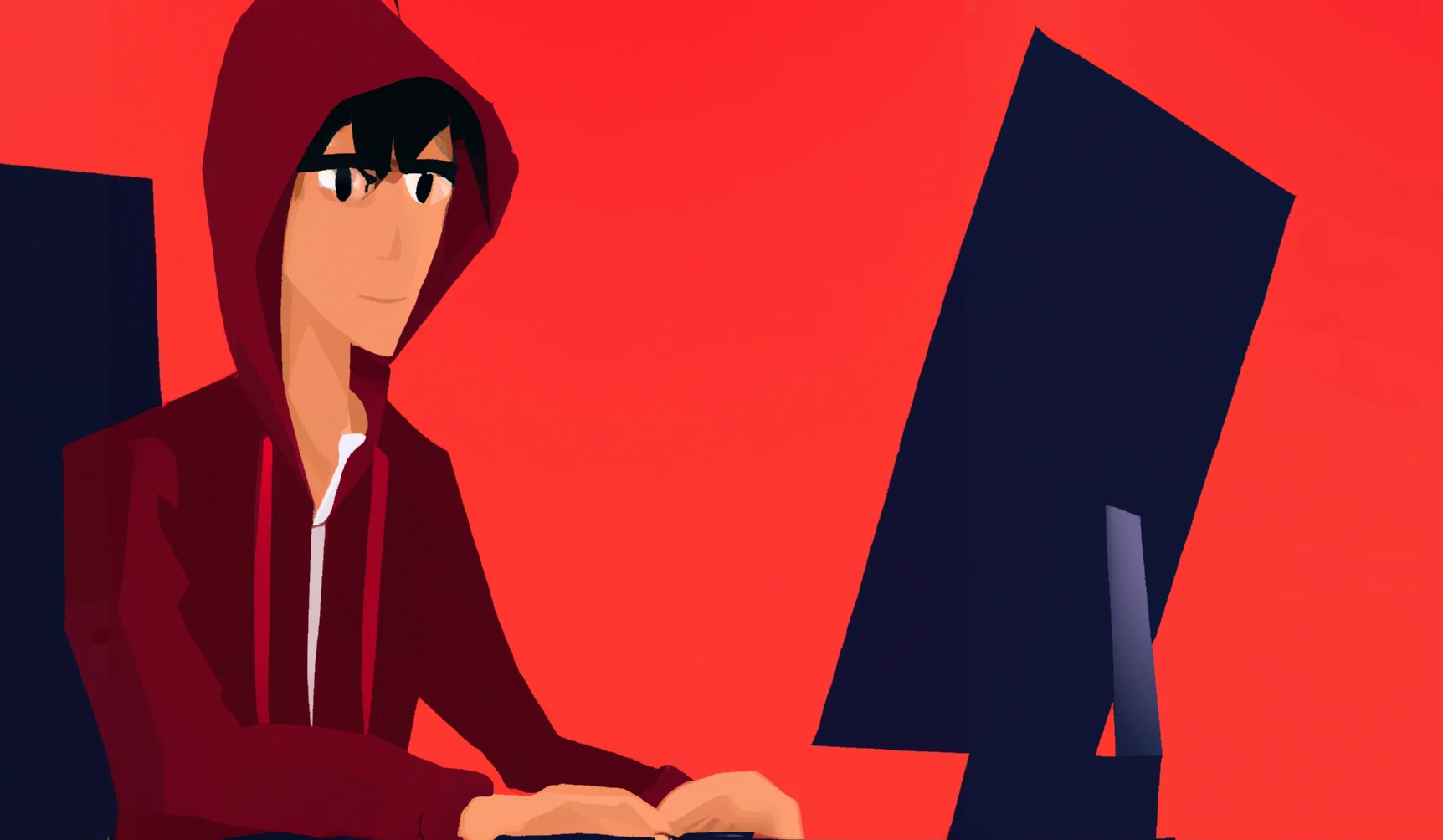 A programmer in a red hoodie sitting in front of a monitor